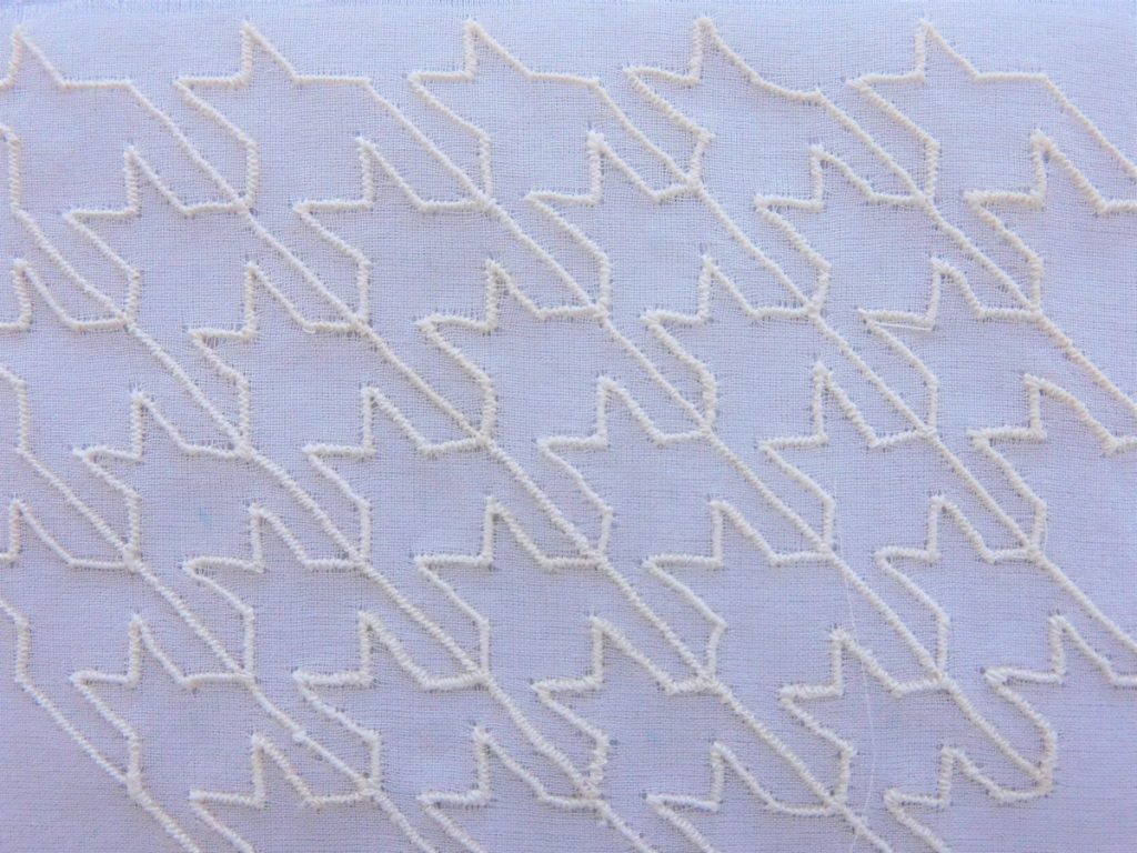 houndstooth embroidery on white organza