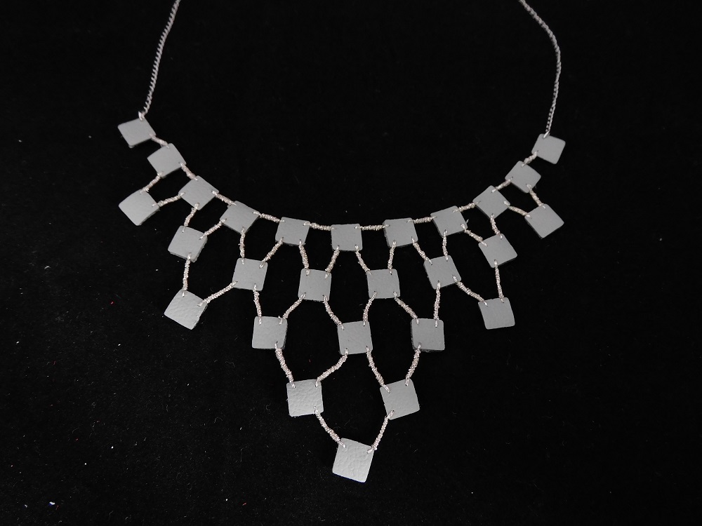 Necklace with recycled leather modules